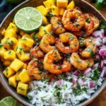 Pikante Garnelen und Mango Salsa Reisbowl