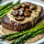 Ribeye Steak with Creamy Mushroom Sauce and Asparagus